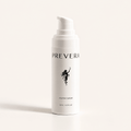 PREVERA Vitamin C Serum in a white pump bottle on a warm ivory background, designed to brighten and support radiant skin.