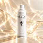 PREVERA Vitamin C Serum surrounded by luminous golden waves, highlighting radiant, bright-looking skin and a healthy glow.